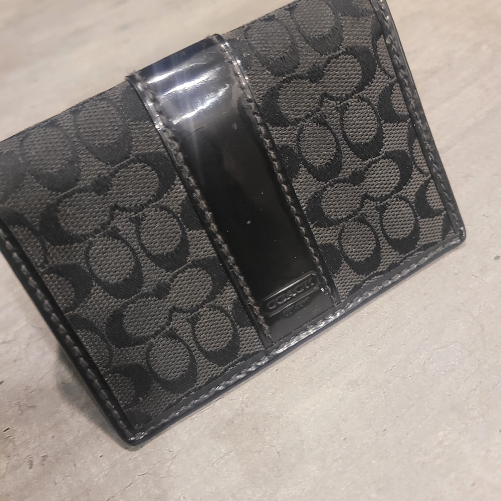 Black and Grey coach handbag with black wallett